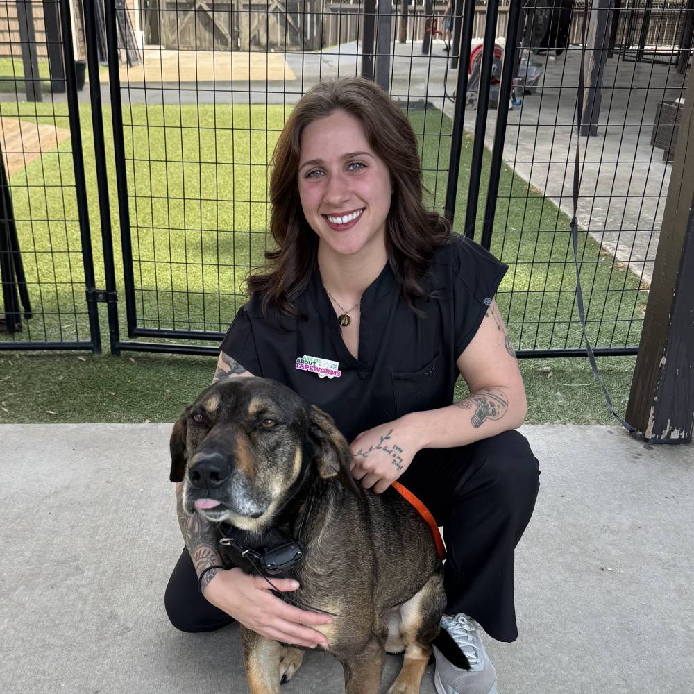 Danielle women sitting with pet outside